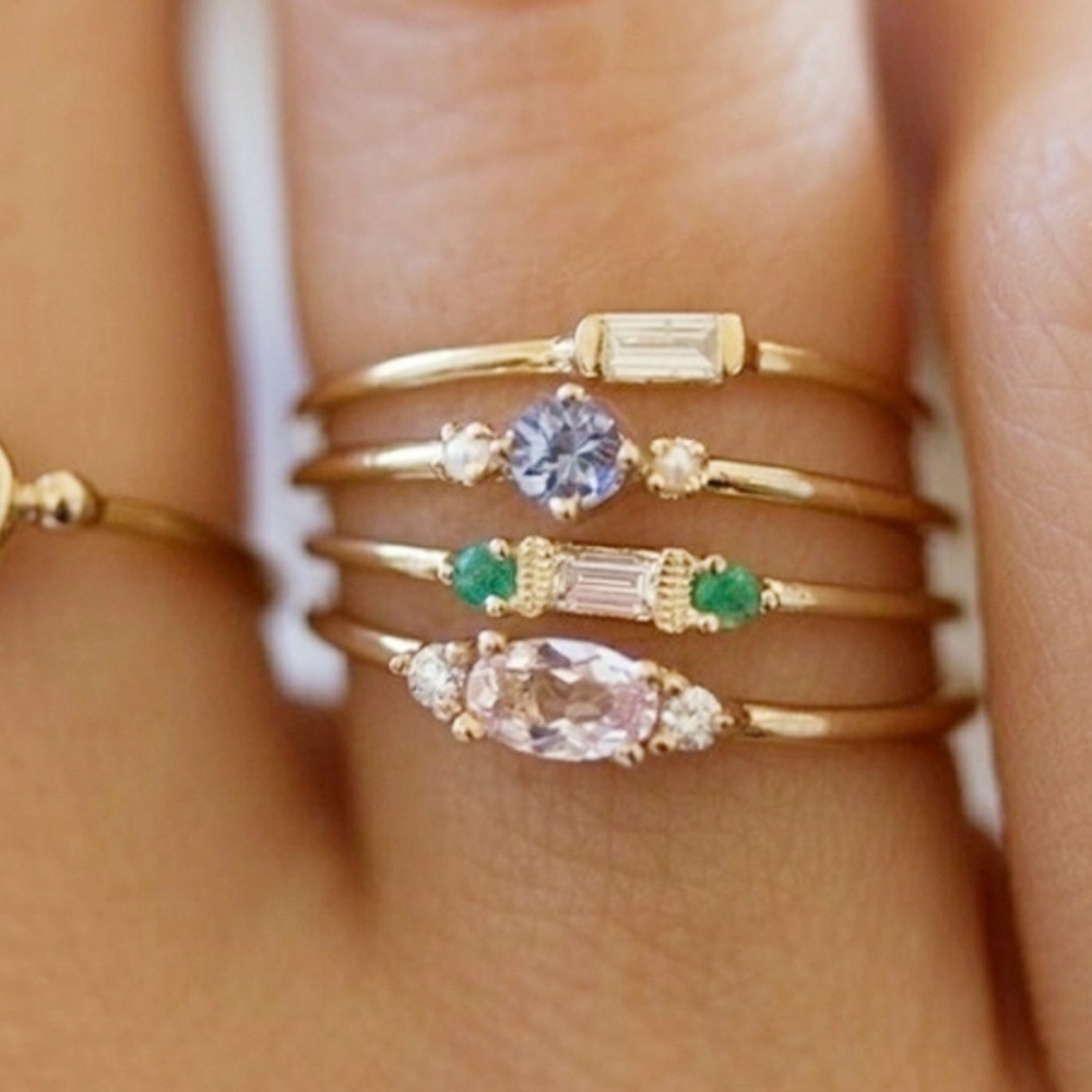NWT 18k gold four piece Ring Set